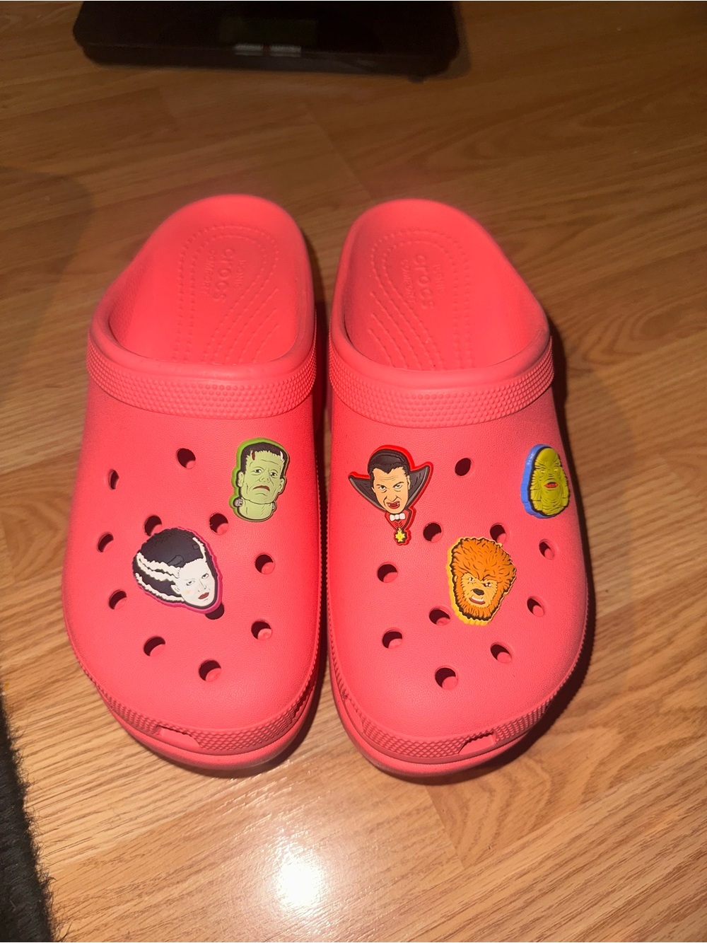 CROCS adults Classic Clog in Bright pink with theOG’s of horror Jibbitz